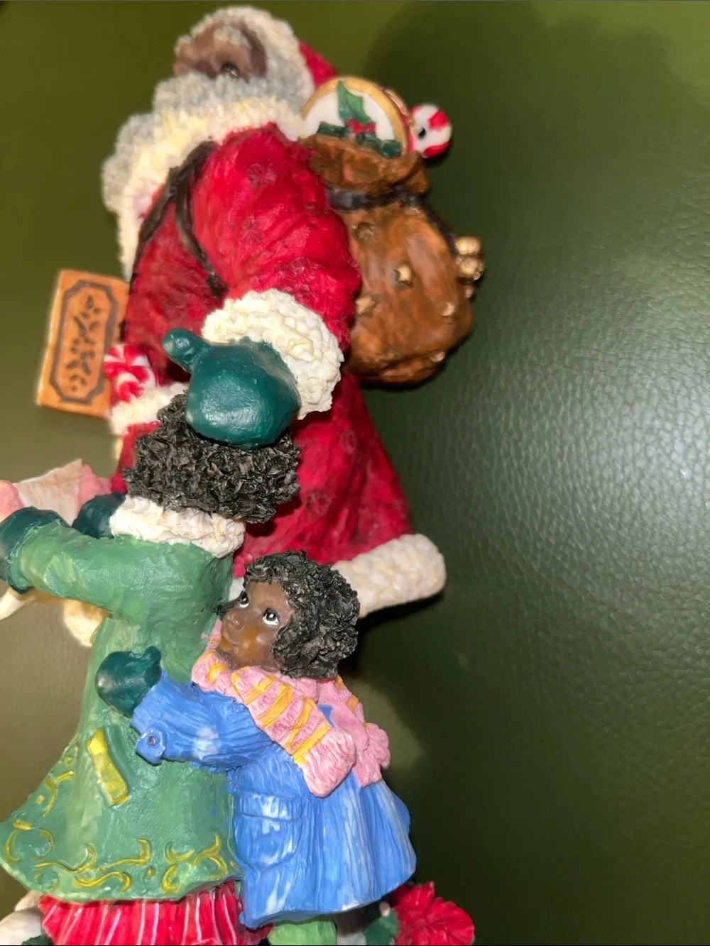 Festive Santa Figurine with Child - Red and Green Holiday Accent